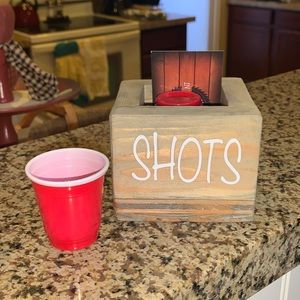 Adorable brand new party shot glass holder . Hand made by a local artist . Wood